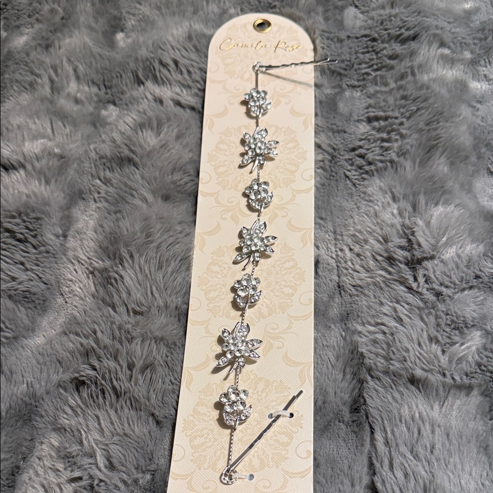 Hair jewelry with Bobby pins attached.